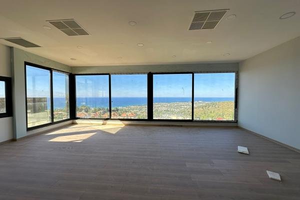 GİRNE LAPTA BÖLGESİNDE PANORAMİK DENİZ MANZARALI SATILIK DAİRE